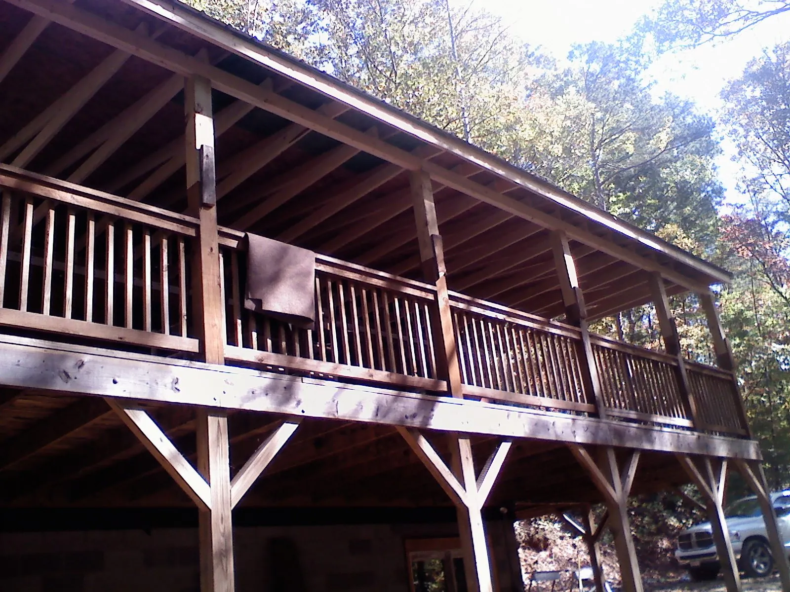 Timber framing under a new elevated porch and deck — Roof Leak Repair in Charlestown by Roofing Brothers